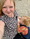 mum breastfeeding in her stylish mum breastfeeding dress uk by stylish mum breastfeeding dress brand 